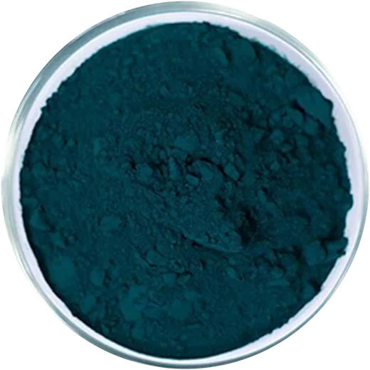 Pigment Green 7 powder in a glass dish